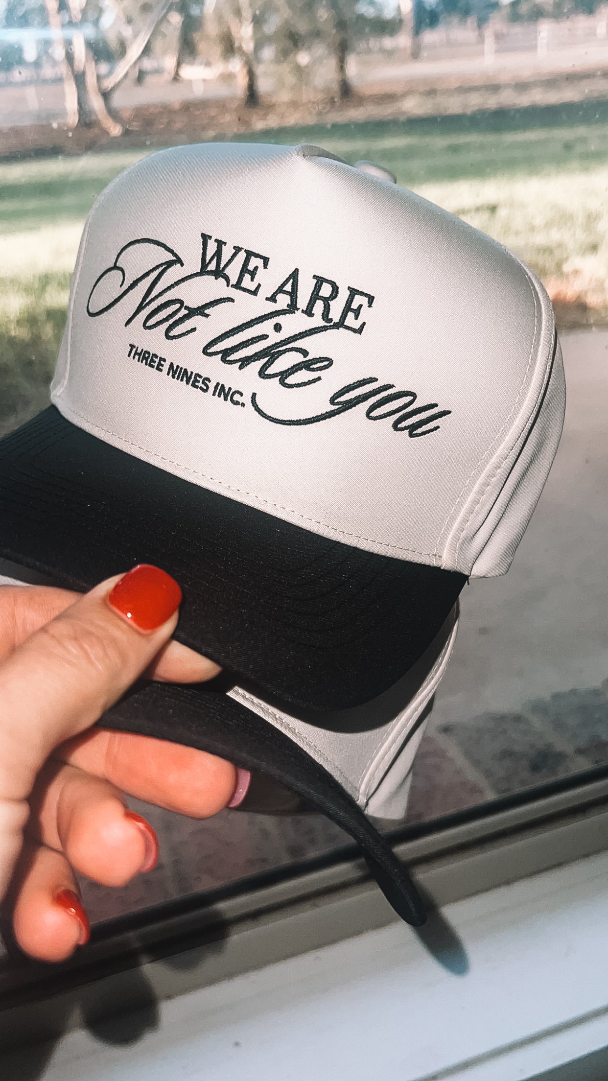 'We are not like you' cap.