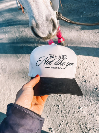'We are not like you' cap.